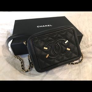 Chanel filigree vanity clutch